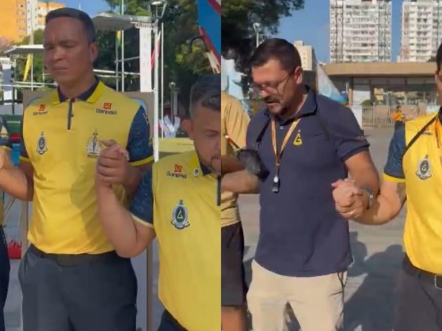 A imagem em destaque mostra o momento de oração dos guardas de Nazaré na Praça Santuário, em Belém.
